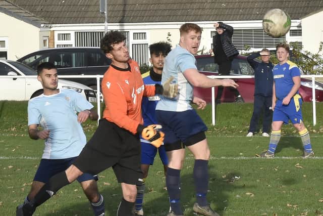 Louis Surtees scores for  Farsley Celtic Juniors in their 9-0 Yorkshire Amateur League Supreme win at Drighlington. Picture: Steve Riding.