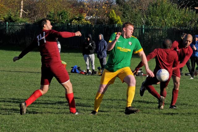 Goalscorer 
James Allan, of Main Line Social, creates a path through the Little London defence during their Sunday Senior Challenge Cup second-round tie. Picture: Steve Riding.
