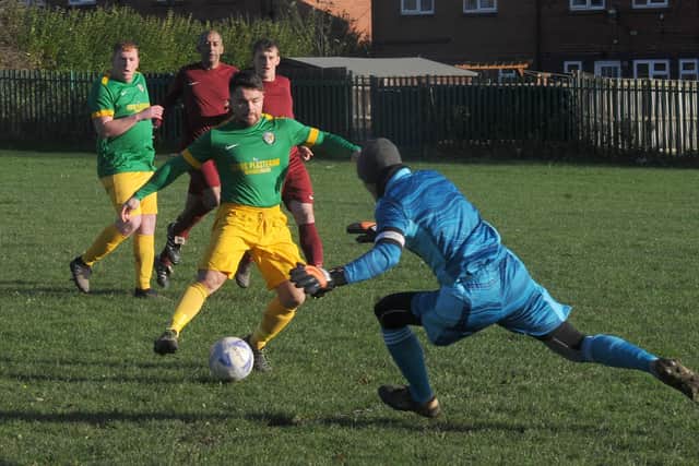 Goalscorer Matty Dalton, of Main Line Social, is closed down by Little London goalkeeper Scott Parker during their Sunday Senior Challenge Cup second-round encounter that went Main Line's way, 9-0. Picture: Steve Riding.