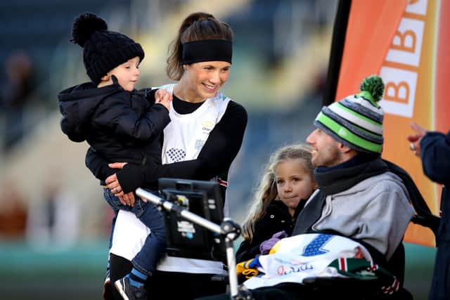 LINDSEY BURROW: With her husband Rob and two of their three children. Picture: Getty Images.