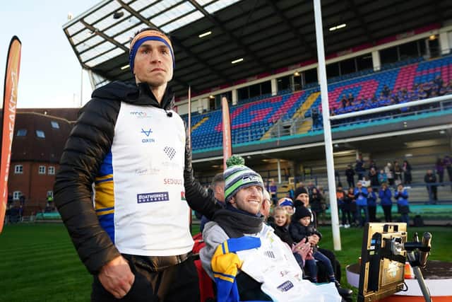 Kevin Sinfield pictured with friend and former Leeds Rhinos team mate Rob Burrow at Headingley. Pic: Zac Goodwin/PA