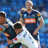 Jai Whitbread, left, in action for Gold Coast Titans. Picture by Getty Images.
