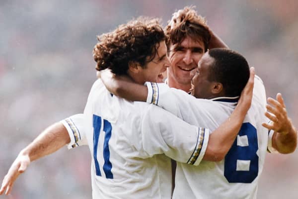 Gary Speed and Rod Wallace celebrate with hat-trick scorer Eric Cantona as Leeds United claim a 4-3 victory over Liverpool in the 1992 Charity Shield.