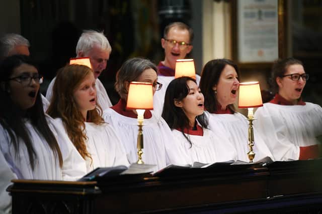 Members of the choir at Leeds Minster perform for the congregation at the 2019 carol service. Picture: Jonathan Gawthorpe