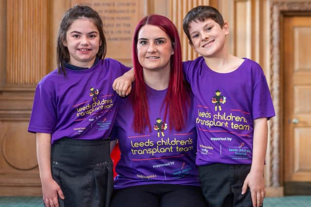 Transplant recipient Mia Mason, nine, with mum Sammi Ramsey and younger brother Harry Mason. Picture: James Hardisty