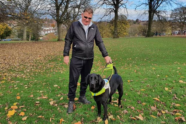 Graham Varley with his guide dog Griffin