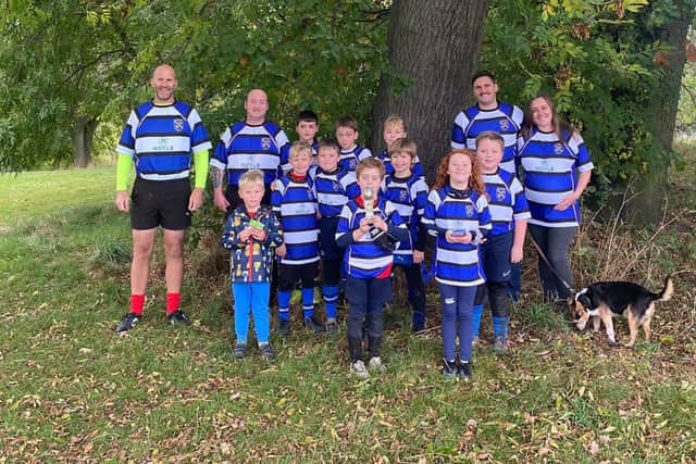 Charlie Hoyle (pictured back right) with children from Yarnbury RFC in the shirts he has sponsored.