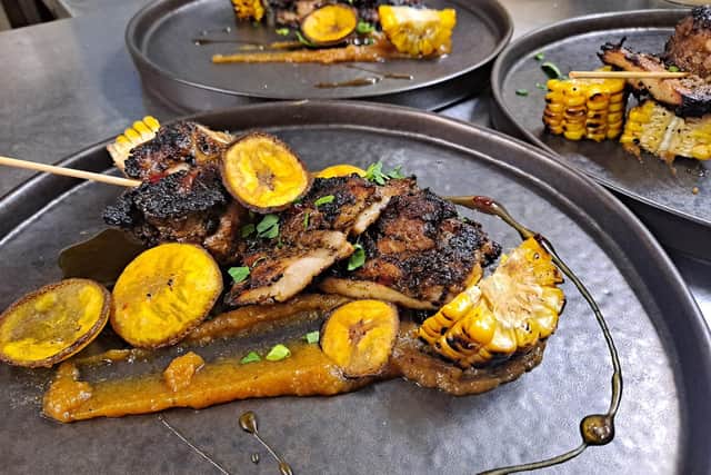 Attendees can enjoy ackee and saltfish cakes with a scotch bonnet mayo, jerk chicken skewers partnered with plantain jam, classic curry goat and banana blossom stew, amongst other dishes. Photo: Chophaus