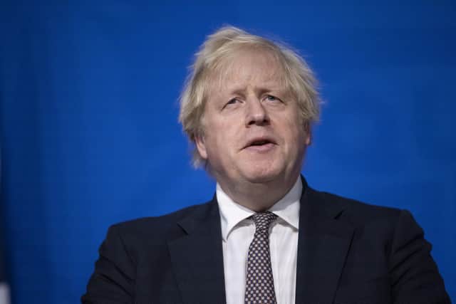 Boris Johnson announces tightening of coronavirus rules after Omicron reaches UK
 JEFF GILBERT/THE DAILY TELEGRAPH