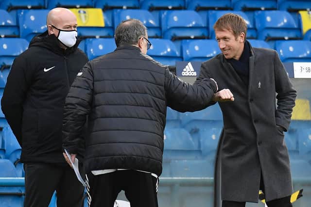 WE MEET AGAIN: Leeds United head coach Marcelo Bielsa, left, and Brighton boss Graham Potter, right, before last season's Premier League clash at Elland Road in January. Photo by JOHN SIBLEY/POOL/AFP via Getty Images.