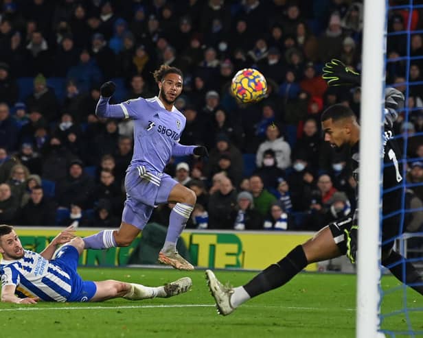 POSITIVE IMPACT: From Leeds United's Tyler Roberts, centre, who was denied on three occasions by 'keeper Robert Sanchez, right, in Saturday evening's goalless draw at Brighton. Photo by GLYN KIRK/AFP via Getty Images.