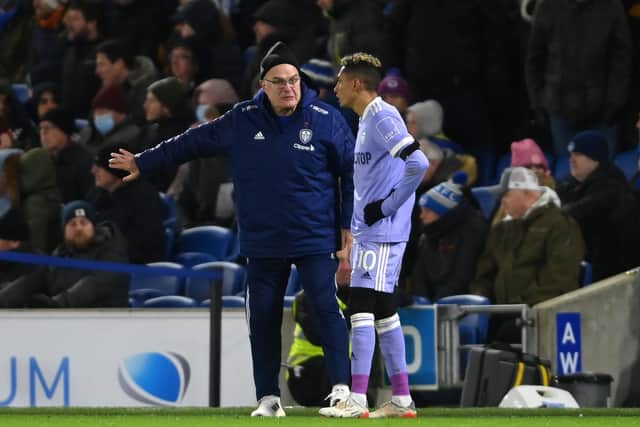 DEBATABLE CALLS: Made by Leeds United head coach Marcelo Bielsa, left, pictured talking to star winger Raphinha during Saturday evening's goalless draw at Brighton. Photo by Mike Hewitt/Getty Images.