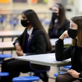 Under the new guidance, all staff, visitors and pupils in Year 7 - the first year of secondary school - or above, are "strongly advised" to wear a covering, unless exempt. PIC: Getty
