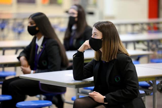 Under the new guidance, all staff, visitors and pupils in Year 7 - the first year of secondary school - or above, are "strongly advised" to wear a covering, unless exempt. PIC: Getty