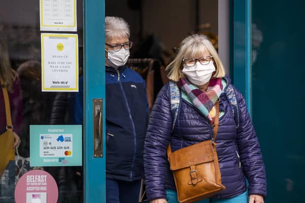 As a response to the new strain of Covid mask wearing will now become mandatory in some settings. Photo: PA/Wire