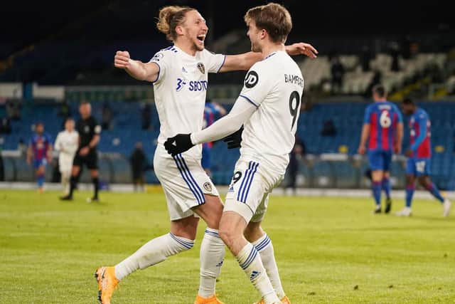 DOUBLE BOOST: Key Whites duo Luke Ayling, left, and Patrick Bamford, right, are both set to play for Leeds United's under-23s on Monday evening at Manchester City. Photo by JON SUPER/POOL/AFP via Getty Images.