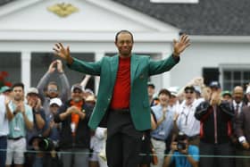 Tiger Woods smiles as he wears his green jacket after winning the Masters golf tournament in April 2019, in Augusta Picture: AP/Matt Slocum