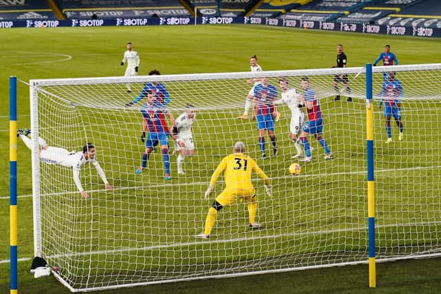 Pascal Struijk heads the ball towards goal in Leeds United's Premier League clash with Crystal Palace at Elland Road in February 2021. Pic: Tim Keeton.