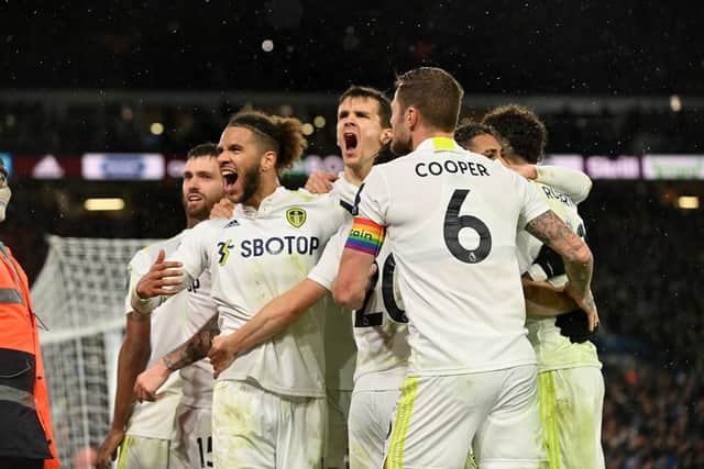 SPECIAL BOND: Leeds United celebrate Raphinha's 93rd-minute penalty in front of the club's passionate fans in Tuesday night's clash against Crystal Palace at Elland Road. Picture by Bruce Rollinson.