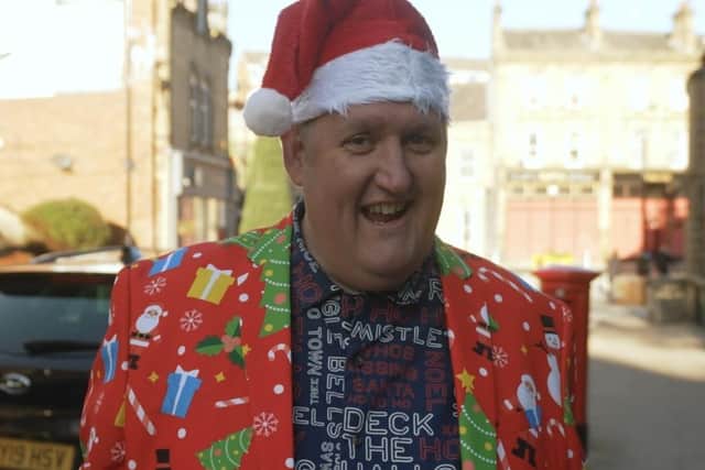 Rate My Takeaway star Danny Malin on the set for the video of 'Santa's Takeaway'