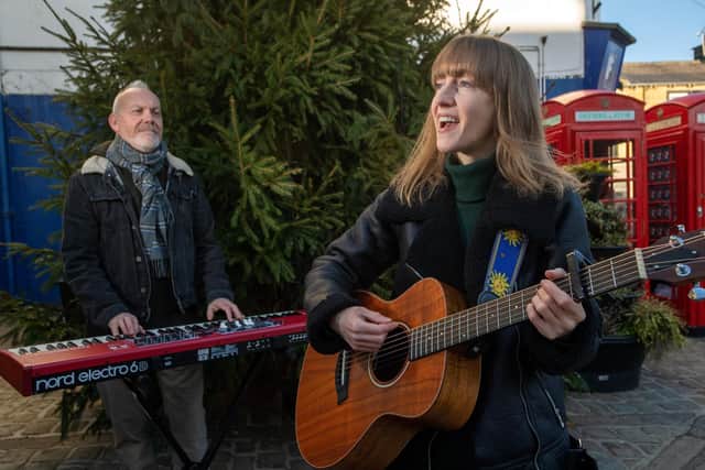 Jennifer Pugh and Richard Sabey musicians from Woolpack Studios, who feature in the 'Otley Advent-ure' video with a backing track, Christmas in a Northern Market Town. Picture Bruce Rollison