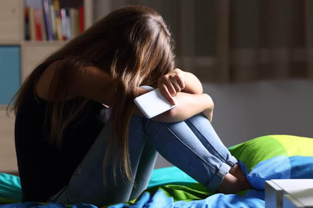 The NSPCC said social media is being used by groomers as a conveyor belt to produce and share child abuse images on an industrial scale. Photo: Adobe Stock.