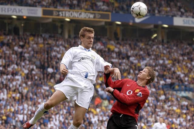Jonathan Woodgate challenges Ole Gunnar Solskjær in the air at Elland Road in September 2002. Pic: Paul Barker