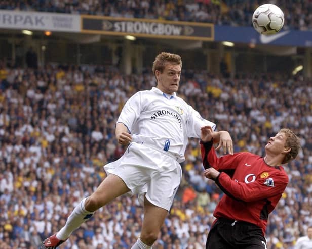 Jonathan Woodgate challenges Ole Gunnar Solskjær in the air at Elland Road in September 2002. Pic: Paul Barker