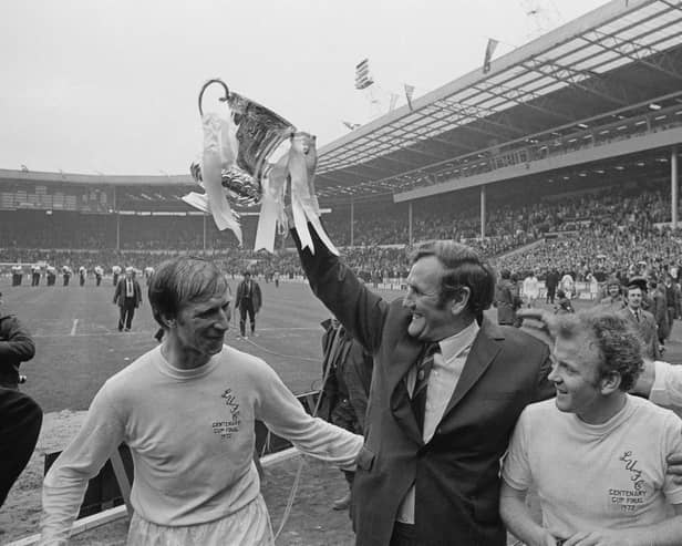 PAST GLORY - Leeds United manager Don Revie lifts the FA Cup in 1972 alongside Jack Charlton (left), Billy Bremner, and Paul Reaney (far right). Pic: Getty