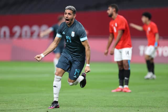 RISING STAR: RC Lens defender Facundo Medina celebrates scoring for Team Argentina against Egypt during the summer's Tokyo Olympics. Leeds are reportedly eyeing the 22-year-old defender. Photo by Masashi Hara/Getty Images.