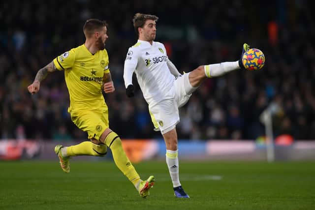 EMOTIONAL RETURN: For Brentford captain and former Leeds United defender Pontus Jansson, left, pictured looking to keep tabs on Whites striker Patrick Bamford during Sunday's 2-2 draw at Elland Road. Photo by Stu Forster/Getty Images.