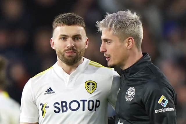 Leeds United man-of-the-match contender Stuart Dallas chats with Brentford's Sergi Canos after the final whistle following Sunday's Premier League match at Elland Road. Picture: Tim Goode/PA Wire.