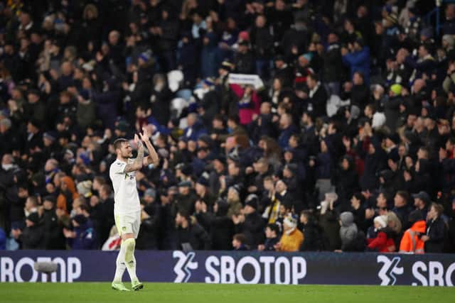 PRAISE: Leeds United captain Liam Cooper applauds the Elland Road crowd after Tuesday night's last-gasp 1-0 success at home to Crystal Palace. Photo by George Wood/Getty Images.