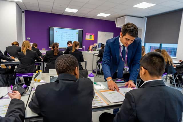 Maths teacher Benjamin Fox, with year 7 students at the newly opened Trinity Academy in Leeds.