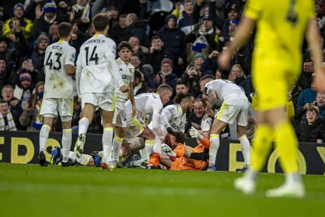 Leeds United's players celebrate Patrick Bamford's late goal at Elland Road. Pic: Tony Johnson