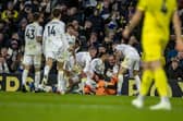 Leeds United's players celebrate Patrick Bamford's late goal at Elland Road. Pic: Tony Johnson