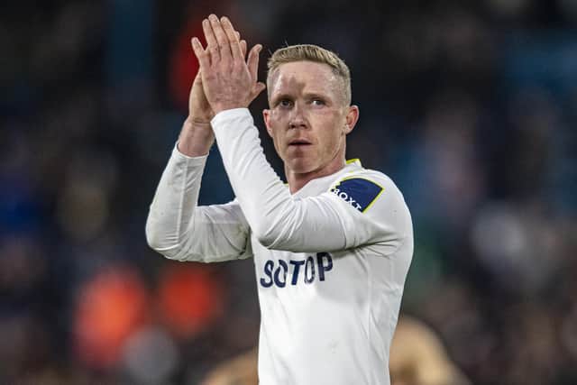 Leeds United's Adam Forshaw salutes the home supporters at Elland Road. Pic: Tony Johnson