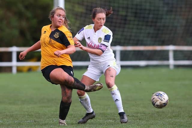 Leeds United Women's Catherine Hamill keeps a close eye on Norton's Bianca Owens. Pic: LUFC