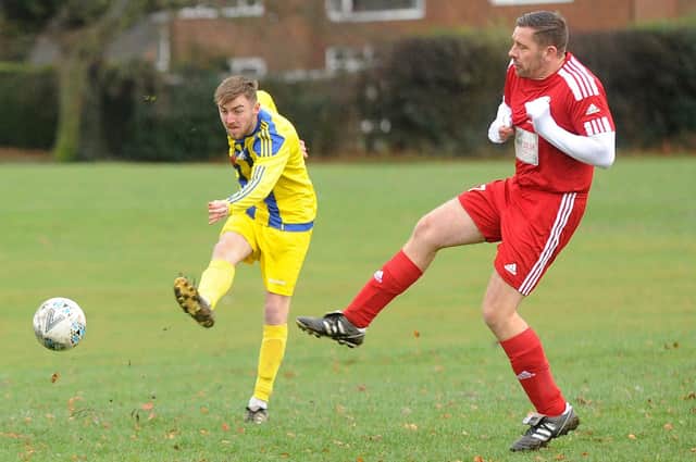 Two-goal scorer Will Scarth shoots in Beeston Juniors OB Reserves' 3-1 win at Shire Academics IV. Picture: Steve Riding.
