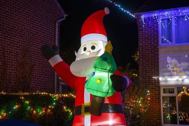 Residents on Farnham Close in Whinmoor, Leeds, are staging a Christmas lights display to  bring some much-needed cheer during the pandemic and raise money for St Gemma's Hospice. 

Picture: Tony Johnson