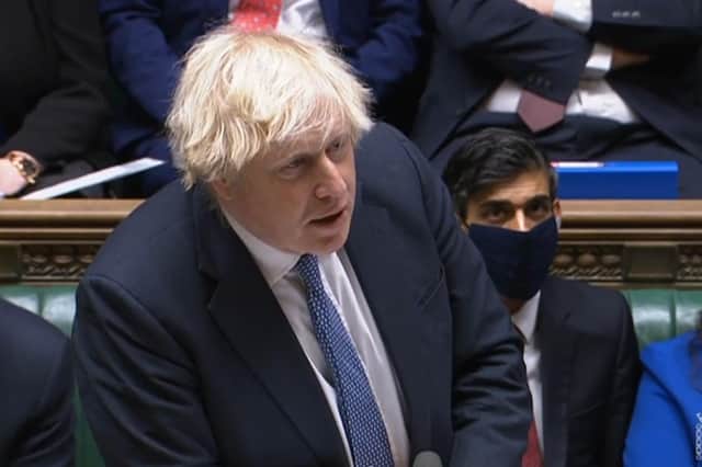 Prime Minister Boris Johnson speaks during Prime Minister's Questions in the House of Commons, London. Picture date: Wednesday December 8, 2021.
PA