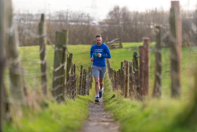 Mark Brooks has run, walked and cycled in a series of challenges to raise money for charity this year. Photo: James Hardisty