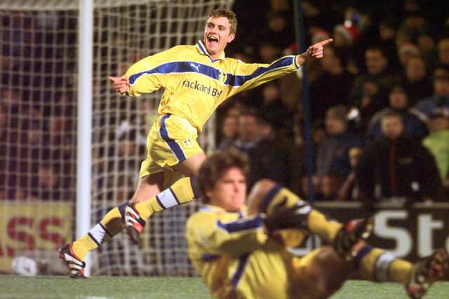 POINTING TO FIRST: Stephen McPhail celebrates netting his first ever goal for Leeds United to put the Whites on course for a 2-0 victory at Chelsea of December 1999 and top of the Premier League in time for Christmas Day. Picture by Gary Longbottom.