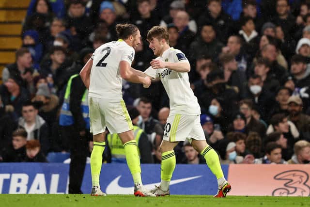 SPECIAL TALENT: Nineteen-year-old Leeds United forward Joe Gelhardt, right, celebrates putting the Whites level at Chelsea next to captain Luke Ayling, left. Photo by Marc Atkins/Getty Images.