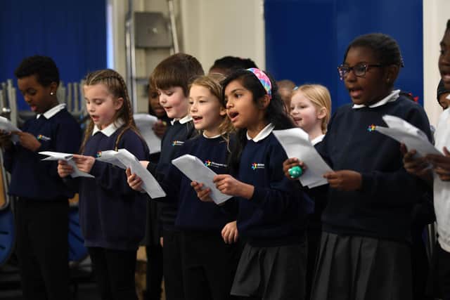 Pupils from Richmond Hill Academy sang carols at the Christmas lunch. Picture: Jonathan Gawthorpe