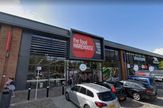 Simon Carlin kicked and spat at police officers as he was arrested for refusing to pay for wine at the Iceland store at Kirkstall Bridge Shopping Park.