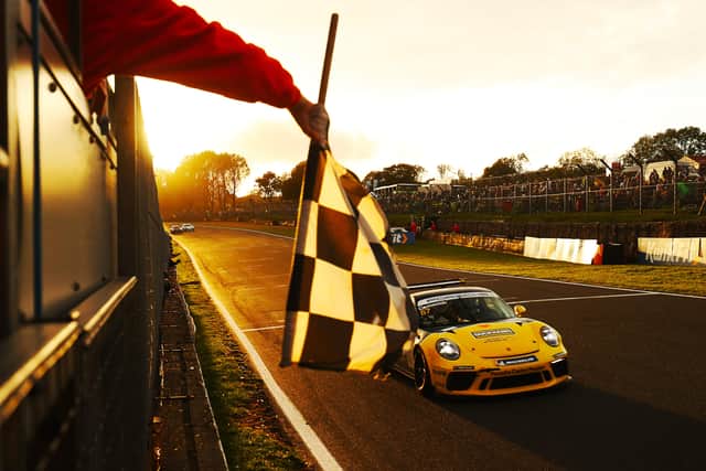 TITLE DELIGHT: Dan Cammish crosses the line at Brands Hatch to clinch the 2021 Porsche Carrera Cup GB championship title earlier this year. Picture: Jakob Ebrey/JEP.