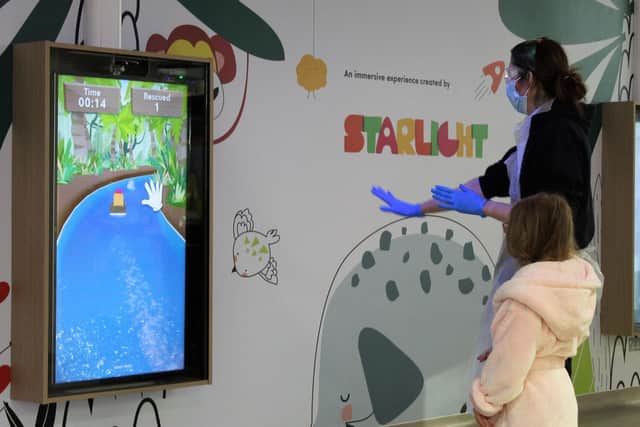 The entrance includes the latest technology, funded by national children’s charity Starlight, to distract and engage patients and their families.
cc LHC