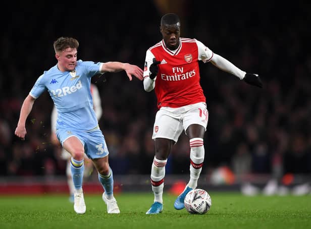 Robbie Gotts puts pressure on Nicolas Pépé during the Whites' 1-0 defeat to Arsenal in the FA Cup third round in January 2020. Pic: Shaun Botterill.