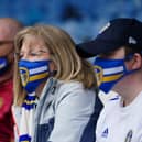 Leeds United fans wearing masks in the stands at Elland Road. Pic: Jon Super.